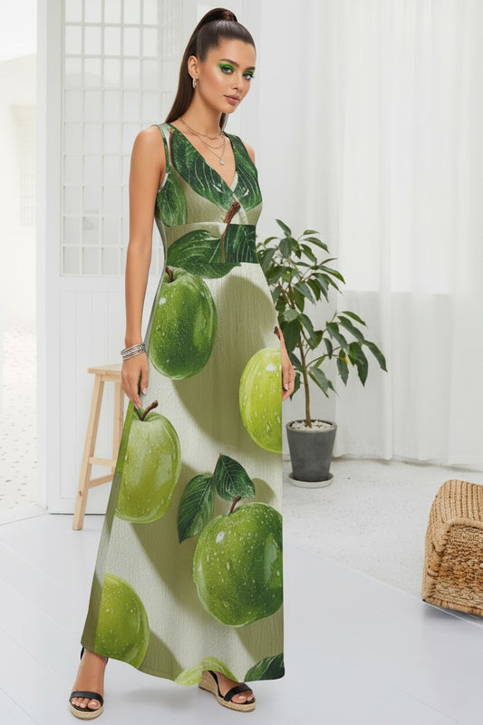Woman wearing a green dress with apple pattern in a minimal indoor setting