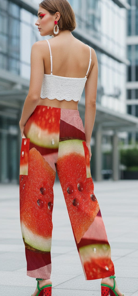 Woman wearing watermelon-themed pants in an urban setting